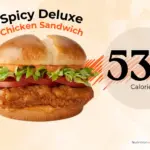 Spicy McCrispy chicken sandwich from McDonald's with text '530 calories'.