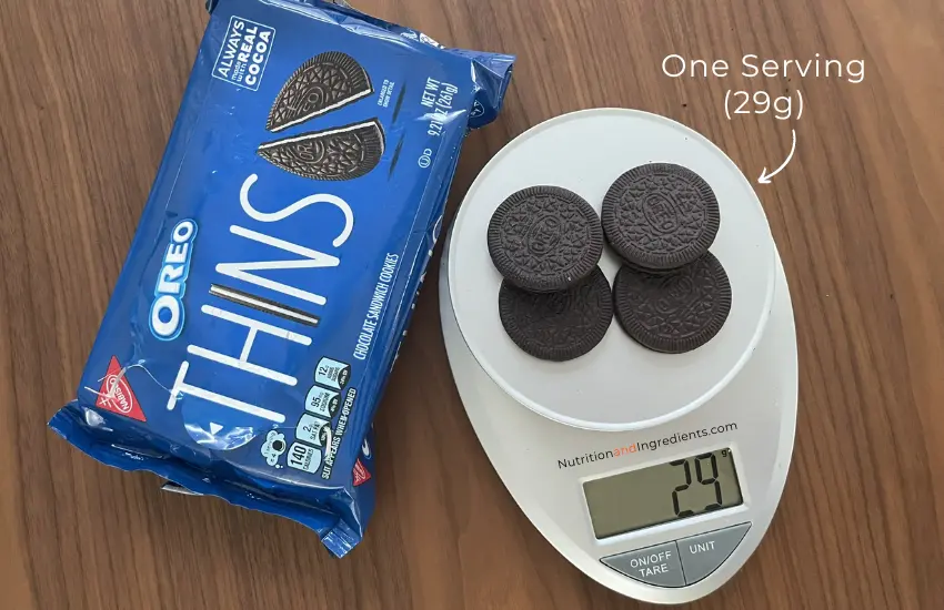 Four OREO Thins on scale to illustrate serving size.