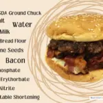 Bacon burger from Five Guys fast food restaurant with list of ingredients.