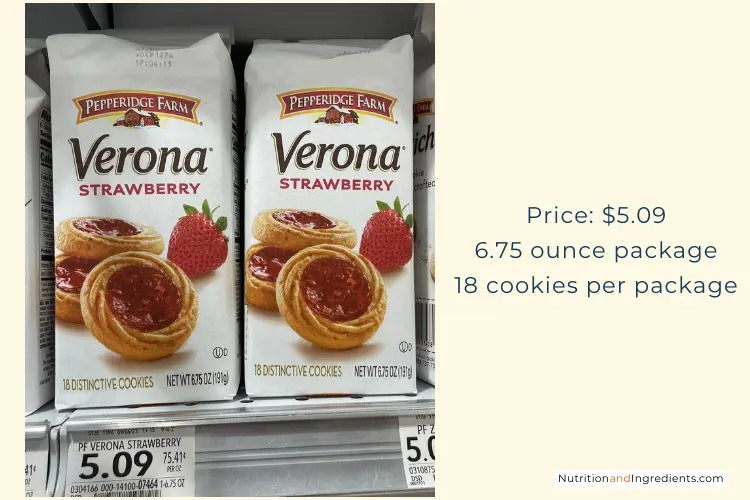 Packages of strawberry flavored cookies on shelf at grocery store.