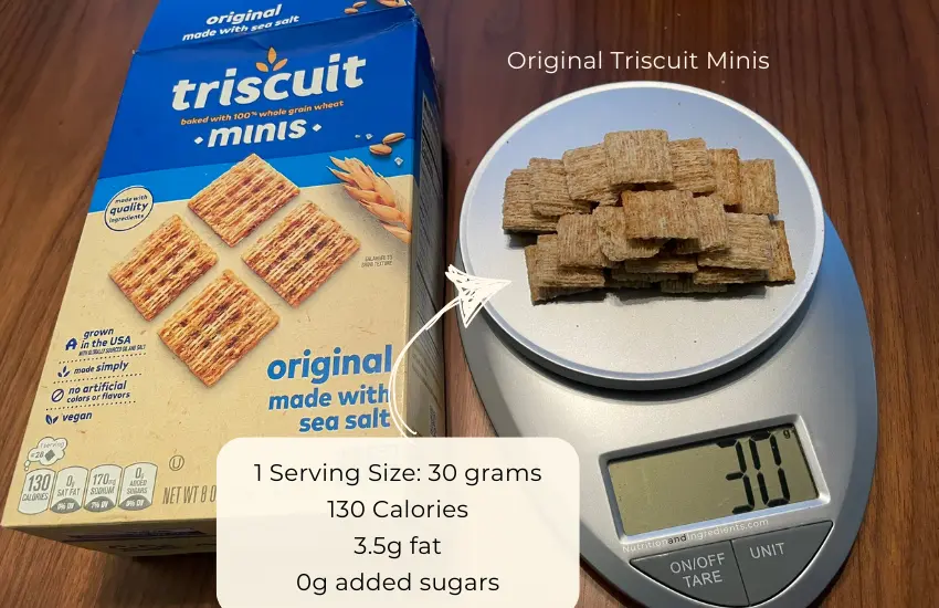 Stack of Triscuit minis on scale to illustrate serving size of 30g.