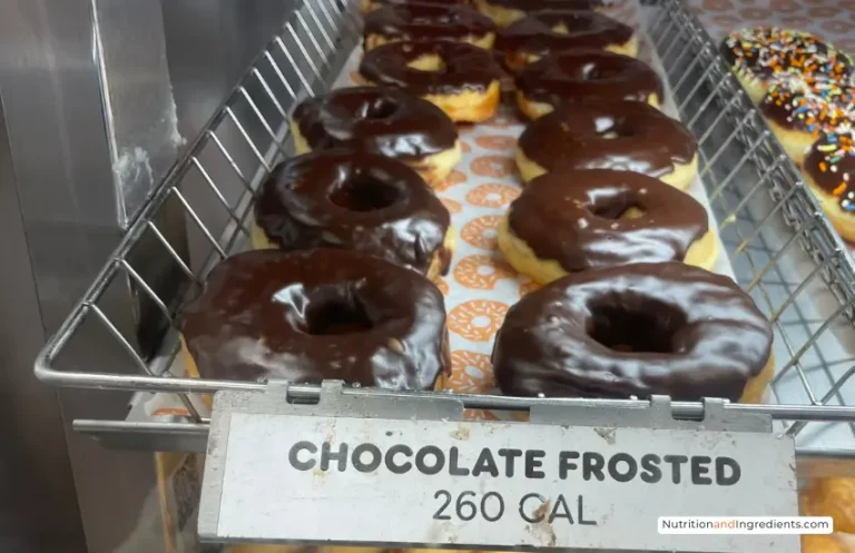 Display of chocolate frosted donuts at Dunkin'.