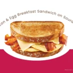 Dunkin' bacon, egg, cheese sourdough breakfast sandwich.