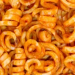 Seasoned curly fries.