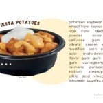 Taco Bell Cheesy Fiesta Potatoes with text list of select ingredients.