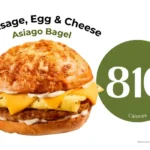 Sausage, egg, and cheese breakfast bagel sandwich from Panera Bread with text '810 calories'.