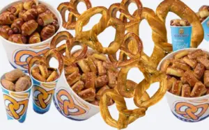 Collage of Auntie Anne's pretzels, pretzel dogs, and dips.