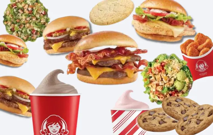 Collage of burgers, frostys, salads, and cookies from Wendy's fast food restaurant.