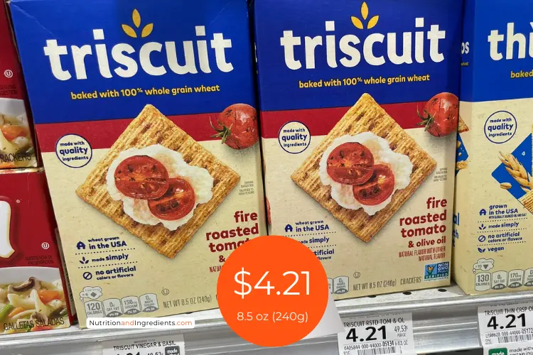 Box of fire roasted tomato flavored Triscuit crackers on store shelf.