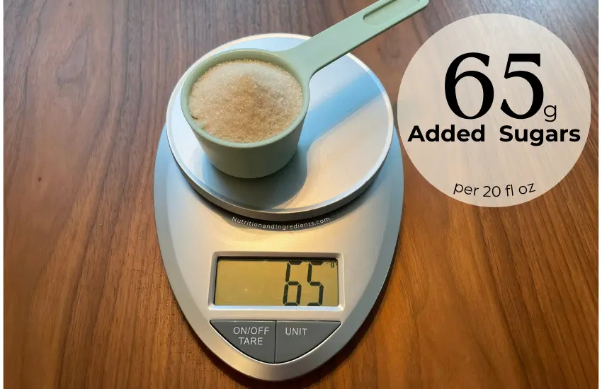 1/3 cup of sugar on scale with weight of 65 grams.