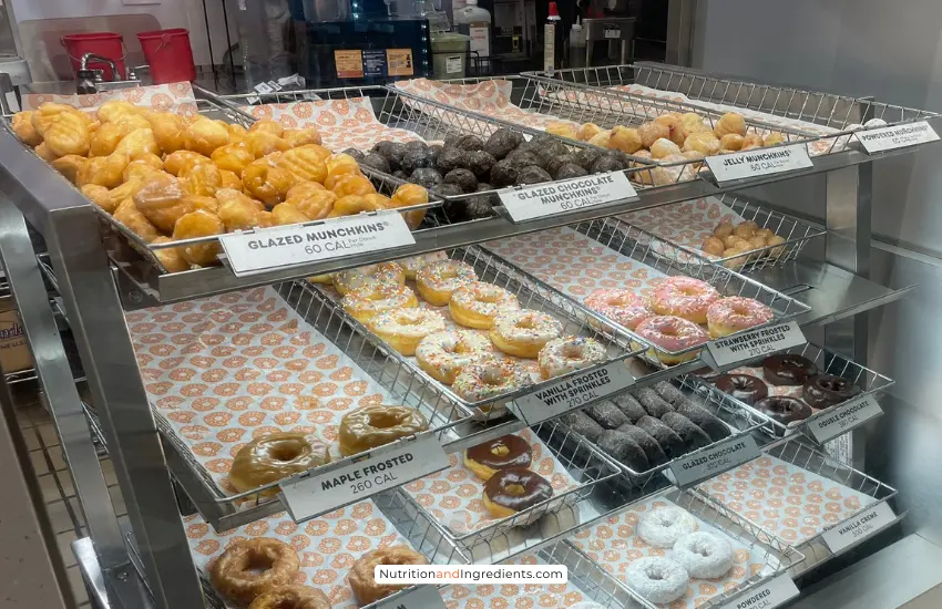 Display of donuts inside Dunkin' Donuts.