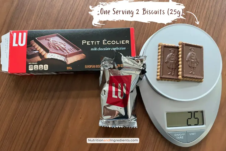 Two cookies on scale illustrating serving size of 25 grams.