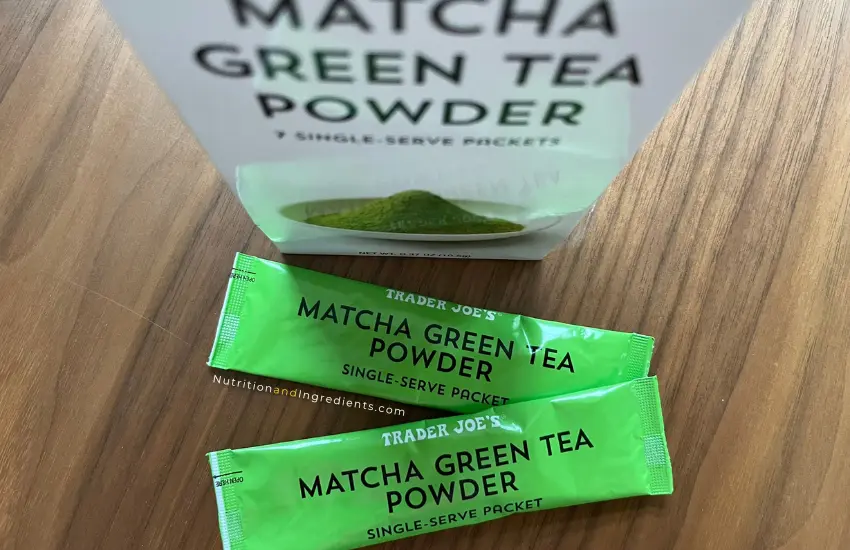 Two small packets of green tea powder.