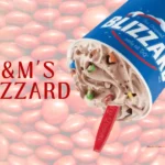 Blizzard in front of a background of red M&M's candies.