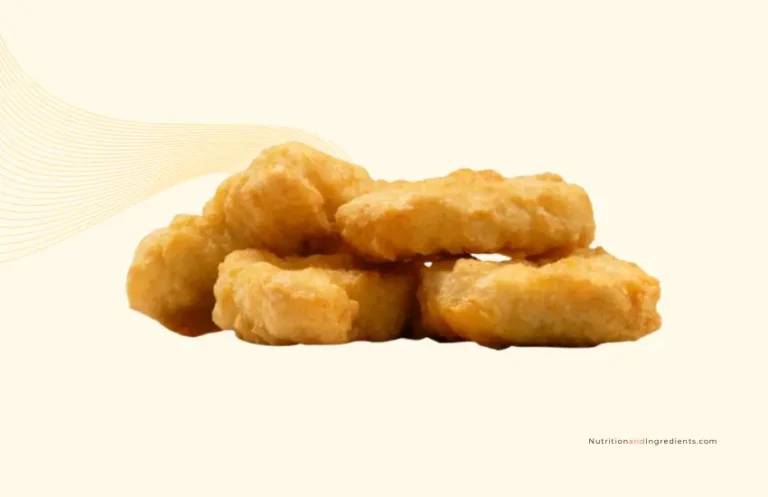 Stack of four chicken nuggets from McDonald's.