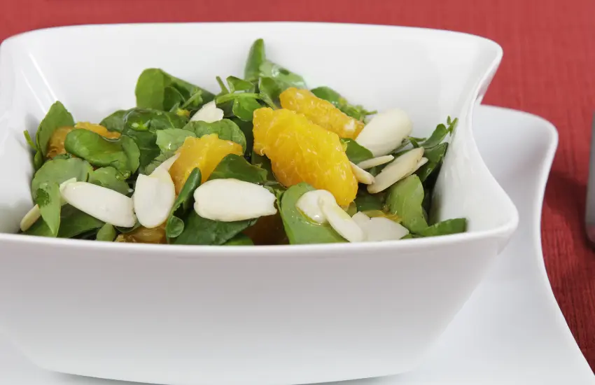 Watercress salad with oranges and sliced almonds.