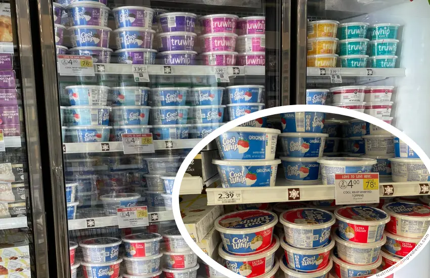 Stacks of Cool Whip in grocery store freezer.