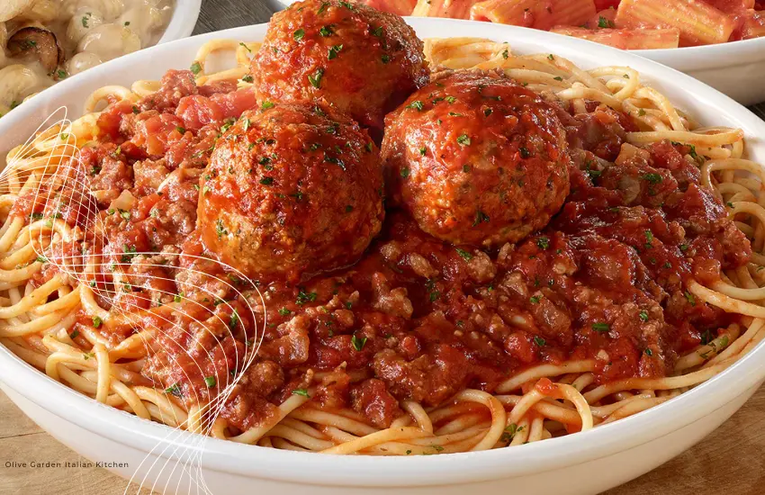 Olive Garden bowl of spaghetti and meatballs.