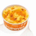 Side dish of mac & cheese from Popeyes fast food restaurant.