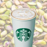 Background of pistachios and hot pistachio flavored latte.