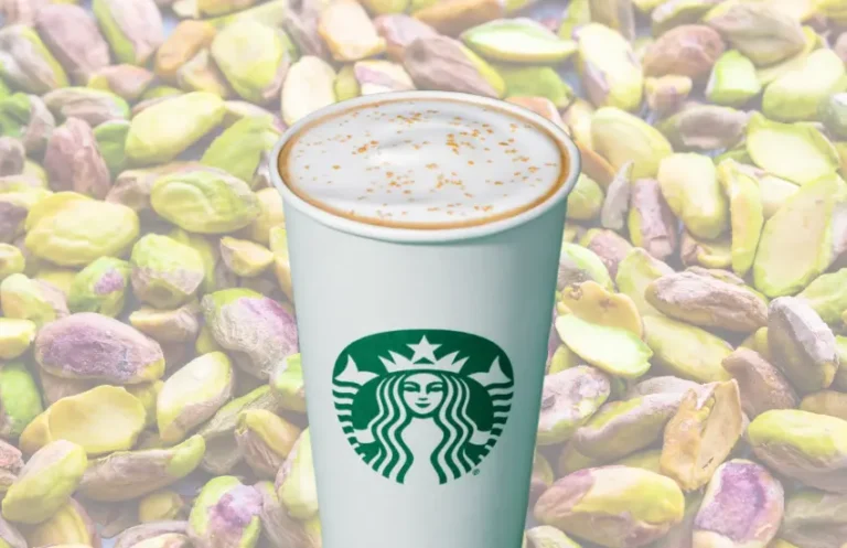 Background of pistachios and hot pistachio flavored latte.