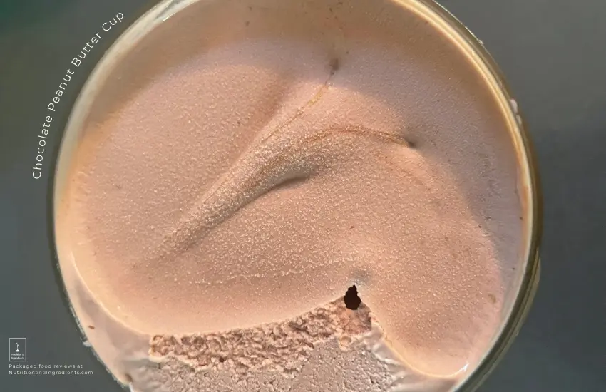 Freshly opened container of Talenti chocolate peanut butter cup gelato.