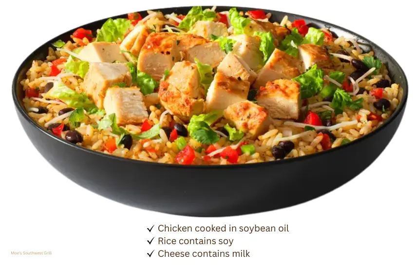 Bowl of rice, chicken, lettuce, and cheese from Moe's restaurant.