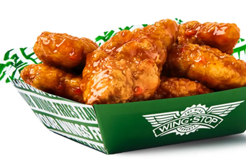 Bucket of flavored chicken wings from Wingstop.